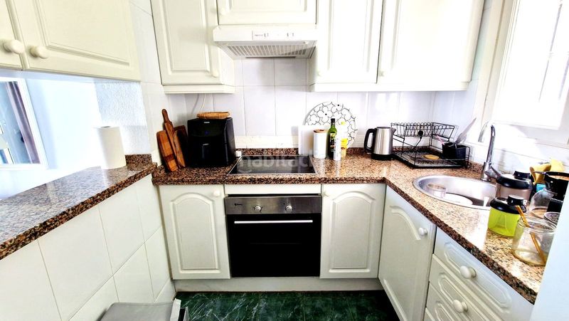 Foto ce72d07f-4f08-487c-8fb7-c54b92deeea5. Casa a schiera con camino piscina in Mijas golf Mijas