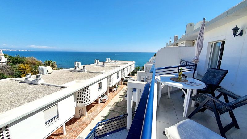 Foto a740f49e-103e-4f3d-89e5-3cf2e1003df5. Casa adossada amb aparcament piscina a El Faro de Calaburra - Chaparral Mijas