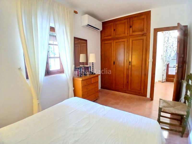 Foto 55bdcc90-1242-49b8-bcc9-14094391a8ba. Casa adossada amb xemeneia calefacció a Centro ciudad Fuengirola