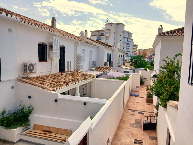 Foto bfc7b25b-0c09-4ac9-a2d1-5a08ef12fe5c. Casa adossada amb xemeneia calefacció a Centro ciudad Fuengirola