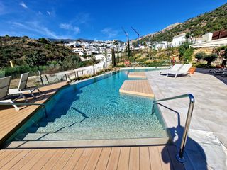 Appartement in Mijas pueblo. Exclusivo apartamento de lujo con jardín y vistas al mar – higue