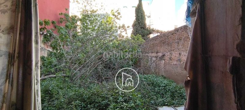 Foto 4f3aa3b4-41c2-43f7-8da3-6de85bc1b711. Casa adossada a Torrefiel Valencia