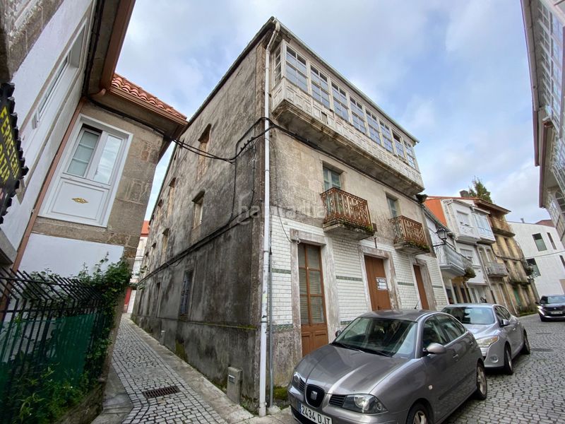 Foto ce6fd0e1-37e9-4a59-9ece-3c6ae3c18ab7. Casa adossada a Corcubión