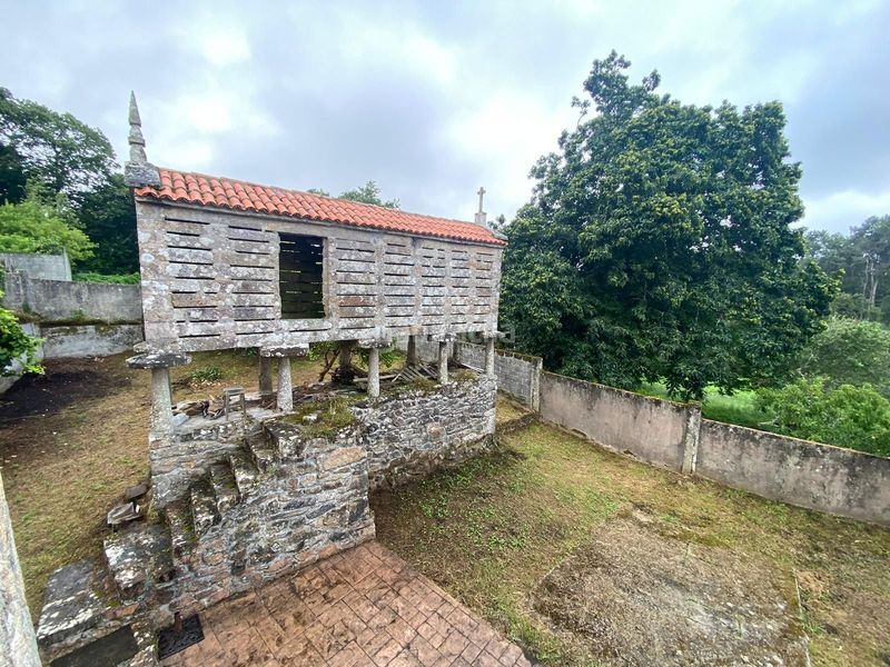 Foto 48b50dd5-7313-4c31-bfb8-b55a7533a8e2. Casa en amarela en Corcubión