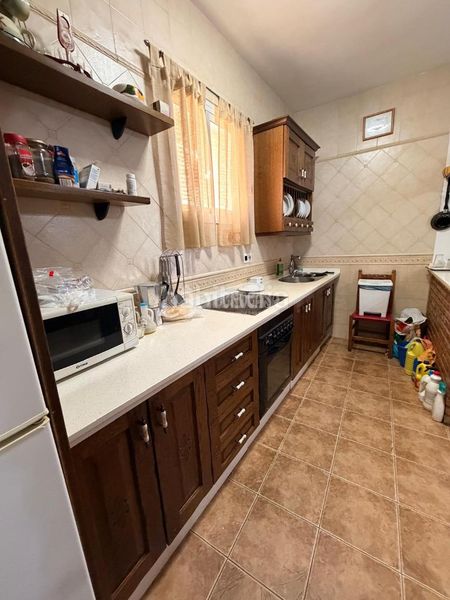 Foto ef50bfcf-db18-43b3-9b9c-3b249cedcc38. Casa aparellada a Zona de la Vega Antequera