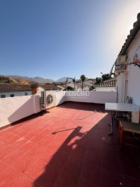 Foto ffa1df9e-48f2-4492-af4a-da65e5c6e794. Casa aparellada a Zona de la Vega Antequera