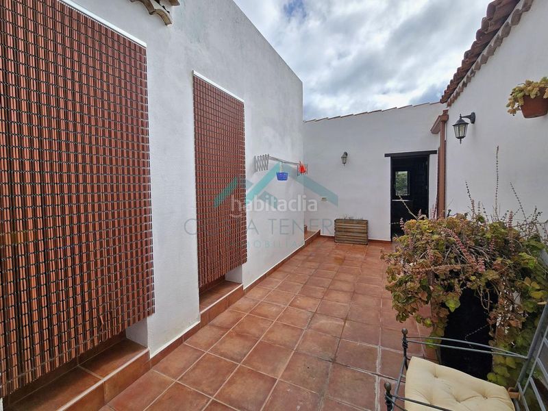 Foto f0f8d6d2-2990-4cca-aaff-e022d17ad31c. Masia a Guía de Isora interior Guía de Isora