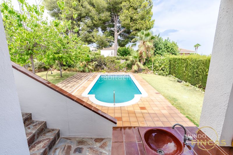 Foto 4ab2bdca-65b1-44bf-aebe-9d87dd0e2f08. Xalet amb xemeneia calefacció aparcament piscina a Coma-ruga