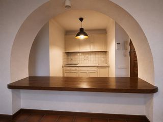 Piccolo appartamento in Muga - Gran Reserva - Badia. Apartamento en planta 12 con vistas al lago y montaña, 2 habitac