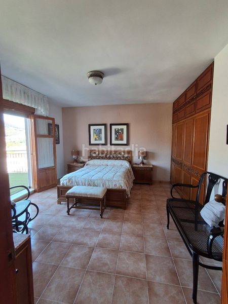 Foto bf6e34fb-3864-4550-be85-234b342faba3. Casa amb xemeneia calefacció aparcament piscina a Loja