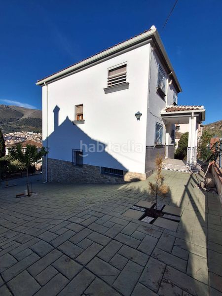 Foto f7f8d60c-22a0-4e8d-a994-0d13afd212dc. Casa amb xemeneia calefacció aparcament piscina a Loja