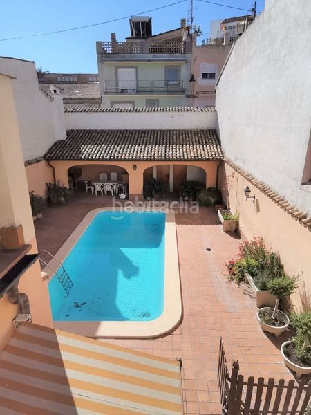 Foto 29aa2575-4145-43c6-8349-96557661b02e. Casa amb calefacció aparcament piscina a Centre-Zona Alta Alcoi