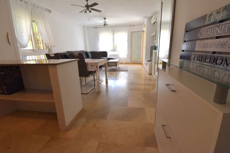 Foto 7c6215b1-9f38-4eae-979c-b656db08684c. Apartament amb aparcament a Playa Flamenca Orihuela