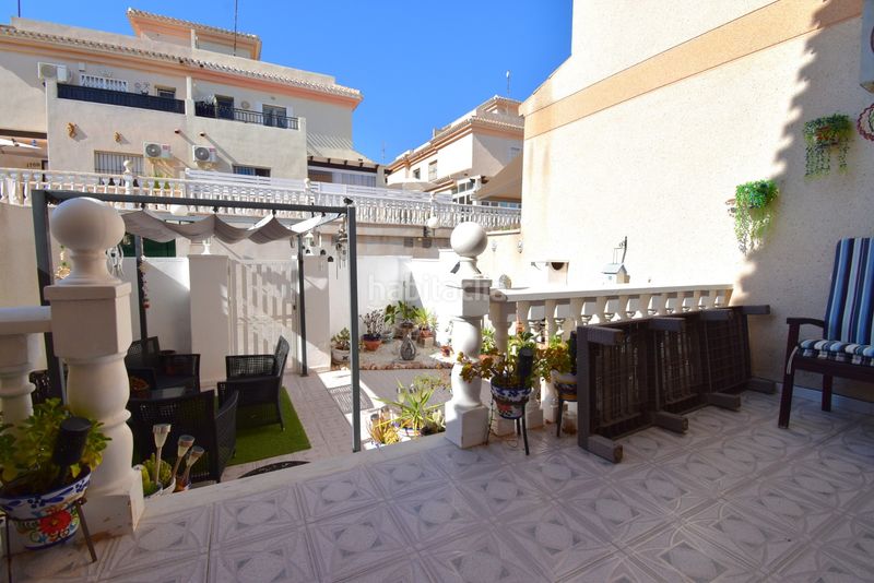 Foto b4ebc0bc-b3b1-4116-a419-dfa50a6b810e. Casa adosada en Playa Flamenca Orihuela