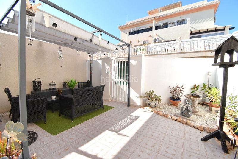 Foto d80c53d2-49b6-4aa9-99cf-0061e1a9e3af. Casa adossada a Playa Flamenca Orihuela