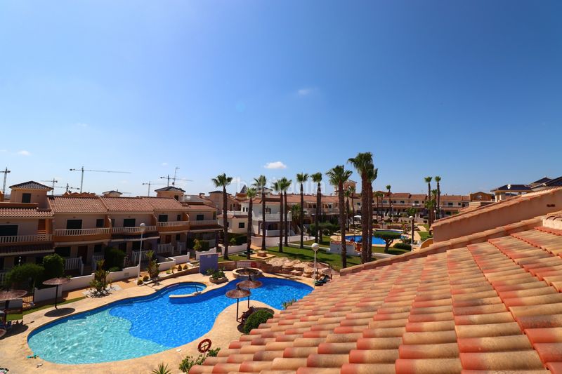 Foto dc128c3a-b5a7-4ad3-8c06-0a57f7d40713. Casa adossada a Lo Marabú Rojales