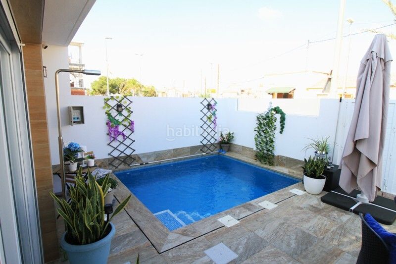Foto 090663b4-2e43-49b6-a9a3-199092fbb53d. Casa adossada amb piscina a Jerónimo y Avileses Murcia
