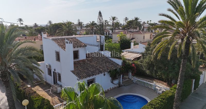 Foto bec573f3-dbfa-4bd5-ae03-42b0a5acffc0. Casa amb aparcament a Cabo Roig Orihuela