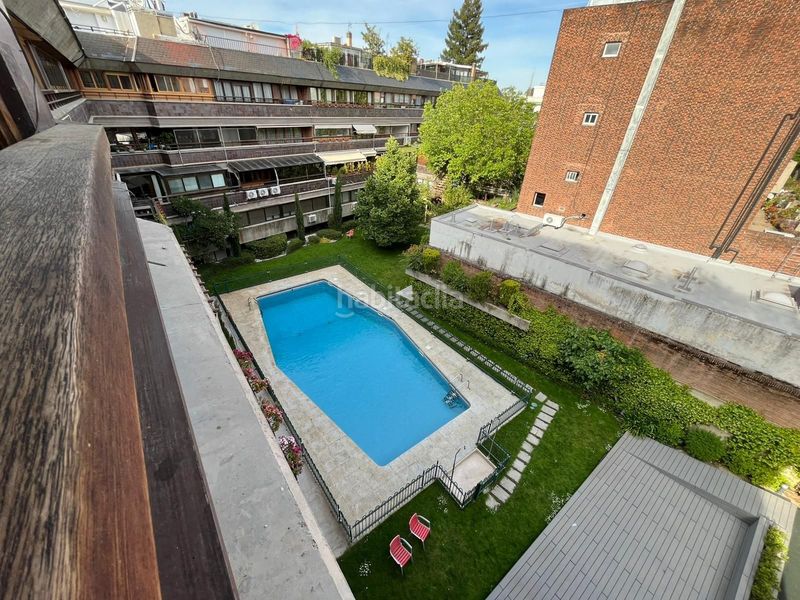 Foto 8c1fc821-7070-4e60-9b1e-b182a062baa0. Ático  dúplex con piscina en Nueva España en Madrid