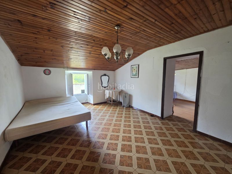 Foto cf3e51fd-8799-4080-8c3f-a95ae42c93f7. Masia amb aparcament a Vimianzo