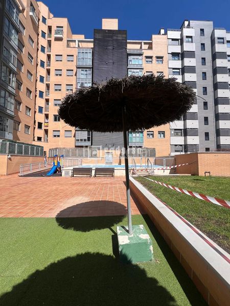 Foto 12cf8645-e8b1-46e7-9090-e4f1f7be74c7. Pis amb calefacció aparcament piscina a Ensanche de Vallecas-La Gavia Madrid