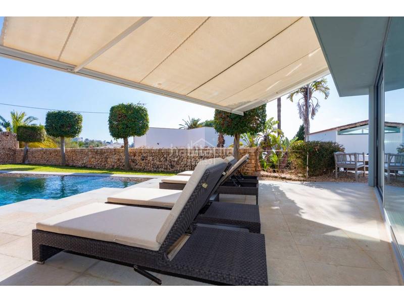 Foto 3234b622-13f6-4c3b-a64e-268fd588529b. Chalet con riscaldamento parcheggio piscina in Cala Llonga-Sa Mesquida Maó