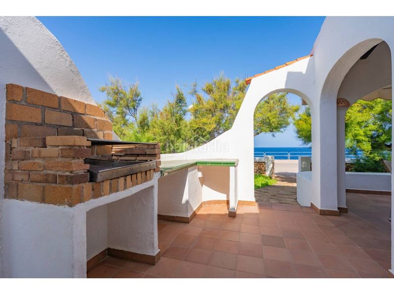 Foto 6ae58d49-1342-4738-a94f-5cf4801932e4. Chalet  en primera línea de mar en cap dartrutx, ciutadella, menorca. en Ciutadella de Menorca