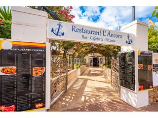 Apartament a Cala en Blanes. Restaurante y amplia vivienda  en calan blanes, ciutadella, meno