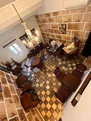 Country house in Es Mercadal Poble. Edificio con alma en el corazón de es mercadal restaurante  vivi