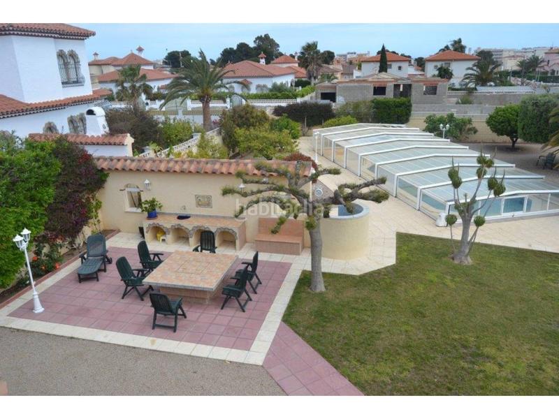 Foto f0f29eaf-f99b-42fa-b047-26bf523242be. Chalet  en venta en Centre Miami Platja