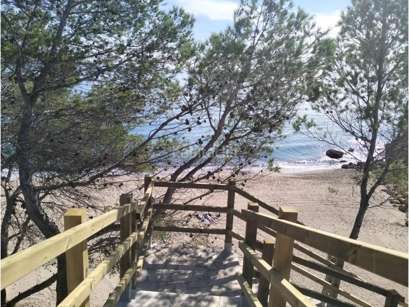 Foto a78c4b0a-a4ed-43a2-bf87-0b5d59556f7d. Casa adosada adosado en primera línea de mar en Passeig Marítim Miami Platja