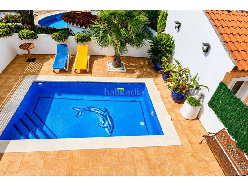 Foto e585badb-851b-4132-8e6f-09b1094b29f1. Doppelhaus mit heizung parking pool in Passeig Marítim Miami Platja