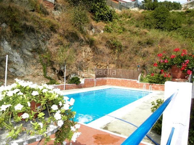 Foto e96f154c-377e-4a04-b249-65cd8724001c. Casa amb xemeneia a Can Moré - Santa Anna - Can Feliu de Merola Pineda de Mar