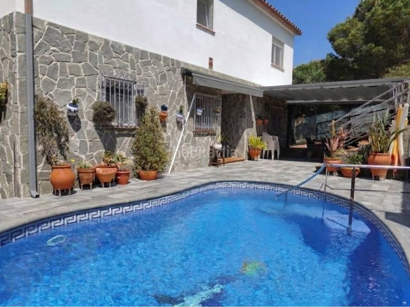 Foto 9ad1da73-577c-4526-ab98-c48314bc3f67. Casa amb calefacció aparcament piscina a residencial Blanes - vistamar Blanes