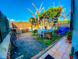 Haus in Cala en Blanes. Chalet adosado con jardín en calan blanes