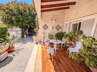 Casa a Ciutadella. Casa con jardín y garaje en ciutadella