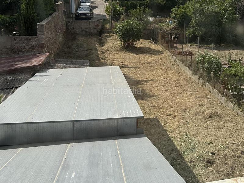 Foto f11ad9b5-74db-4eff-978c-6b88552d06ef. Casa adossada a Llagostera