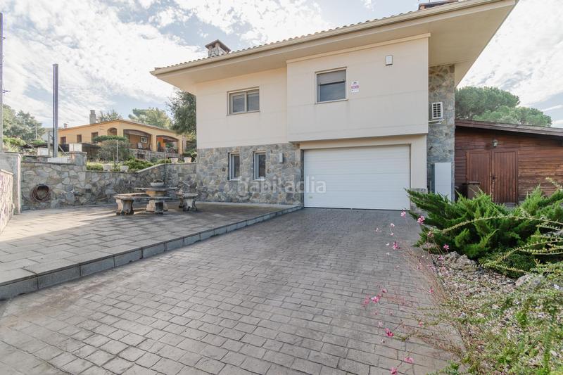 Foto 289c82ff-6aef-4724-b1a3-827136b40368. Casa  con jardín en Caldes de Malavella