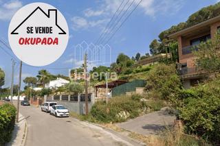 Xalet a Palafolls. Adosadopareadovivienda unifamiliar independiente ocupadoa por pe