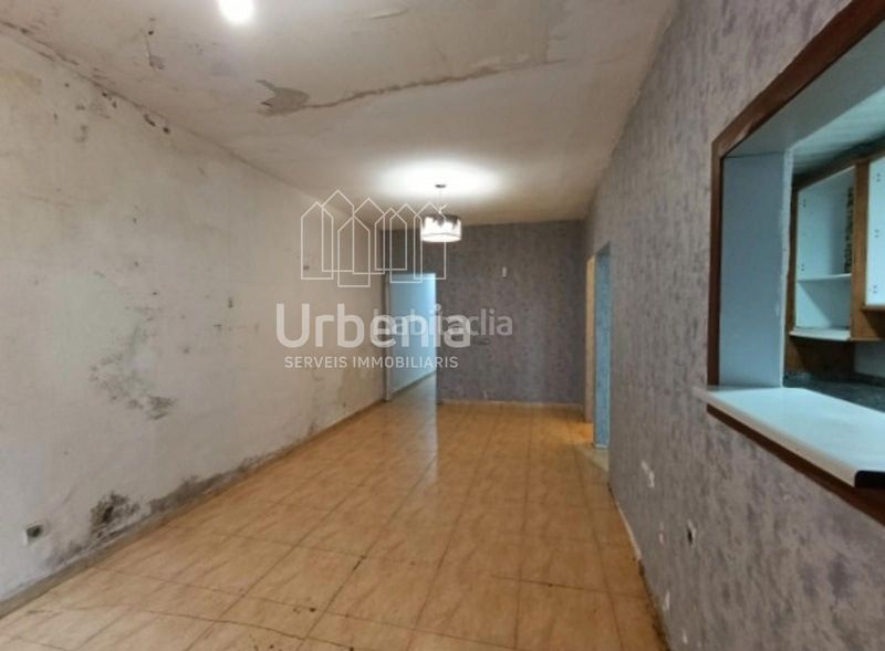 Foto 596ad901-85a5-4964-83df-dcaf9d88c72f. Casa adossada a Poble Nou Terrassa