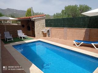 Xalet a Alcanar. Chalet de 180 m2,  5 dormitorios, piscina, barbacoa. a 300 me de