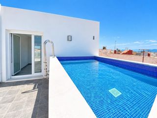 Casa in Piles. Casa de diseño a estrenar con garaje en piles construida en 2024
