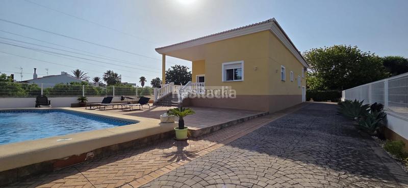 Foto 46e2da5f-cb23-4fef-918d-eb2a48aaa9b9. Chalet villa en Oliva playa Oliva