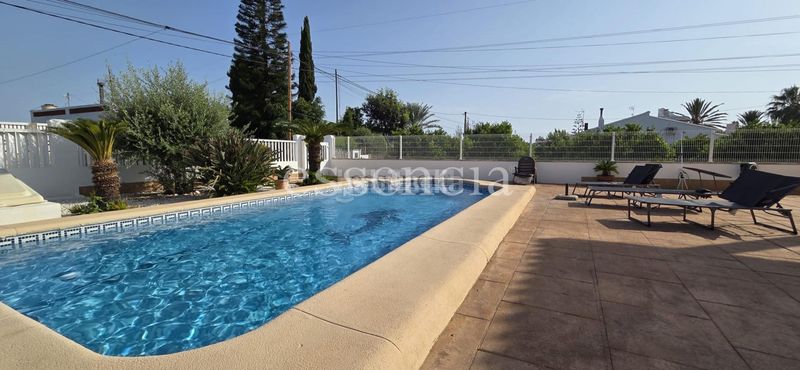 Foto 477b508f-8b4d-4dba-8ef5-d4305b40060c. Xalet amb calefacció aparcament piscina a Oliva playa Oliva