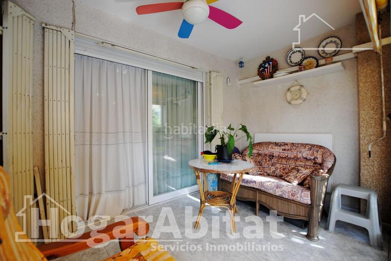 Foto 08e929a8-c1d3-451c-8af5-8863493df9f6. Piso segunda línea de playa! exterior con piscina, garaje y terraza en Daimús