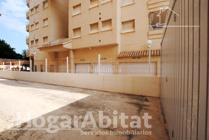 Foto 1204e55b-e755-47b6-818b-cf8896ab2bc1. Piso segunda línea de playa! exterior con piscina, garaje y terraza en Daimús