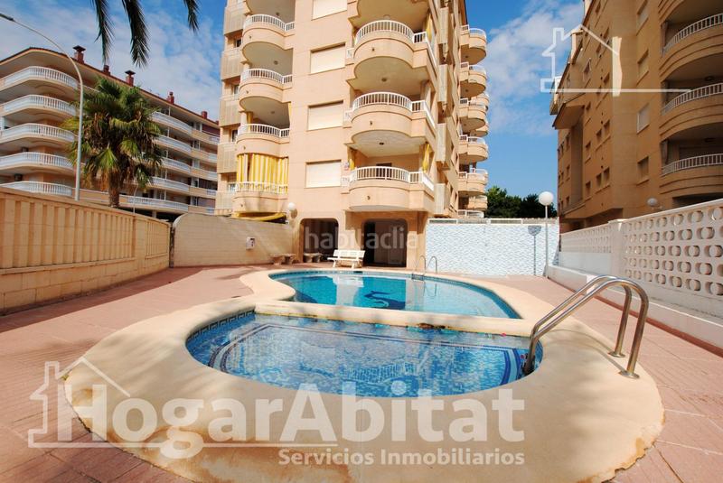 Foto 253e3bb7-201a-423e-ac49-e2f67322feff. Piso segunda línea de playa! exterior con piscina, garaje y terraza en Daimús