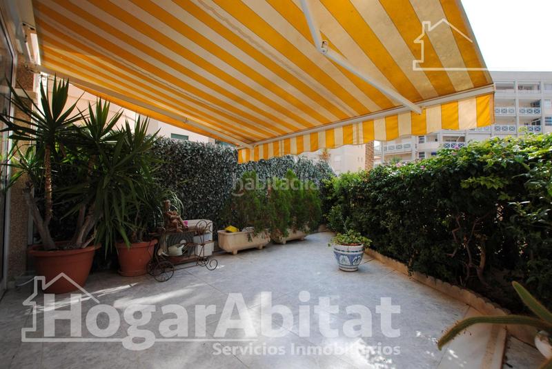 Foto 4142fd7e-1b72-4d2f-928b-c129f77c09dd. Piso segunda línea de playa! exterior con piscina, garaje y terraza en Daimús