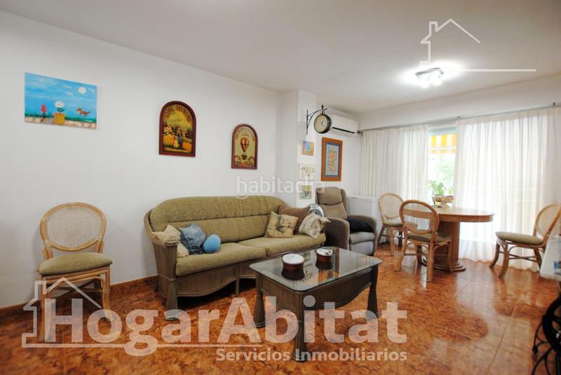 Foto 6310c8fe-50ab-455c-9f2c-895f2a1307e2. Piso segunda línea de playa! exterior con piscina, garaje y terraza en Daimús
