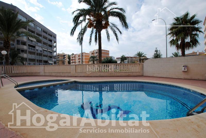 Foto 7caa0ab7-79aa-4f29-9d53-668f2e1722f3. Piso segunda línea de playa! exterior con piscina, garaje y terraza en Daimús